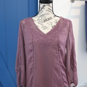 Daniel Rainn detail top